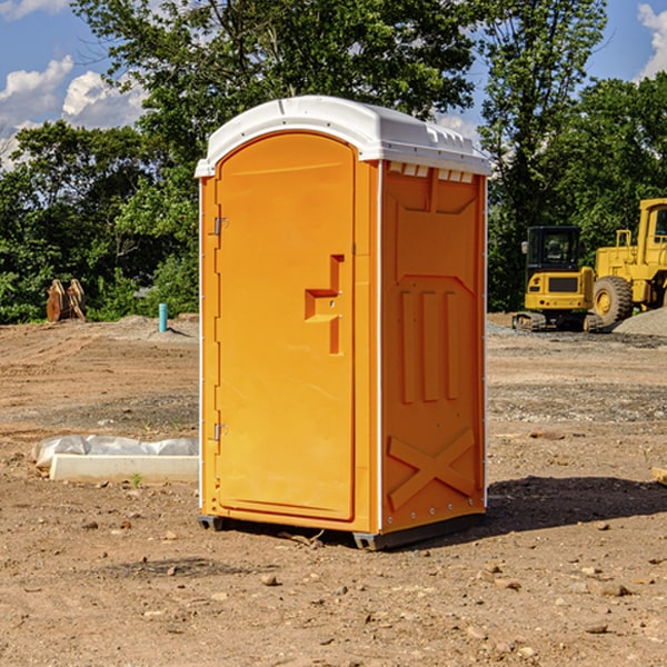 how often are the portable restrooms cleaned and serviced during a rental period in Donald OR